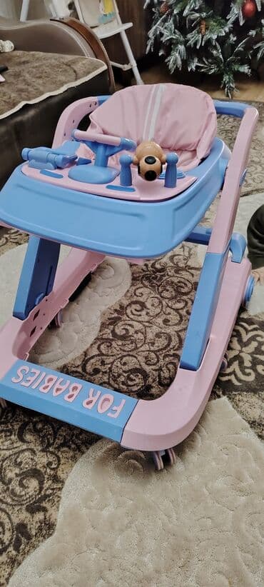 Iran Khodro: Uşaq gəzdirəci (yorğalı “walker”) - Rəng: çəhrayı–mavi - Ön panel — 1