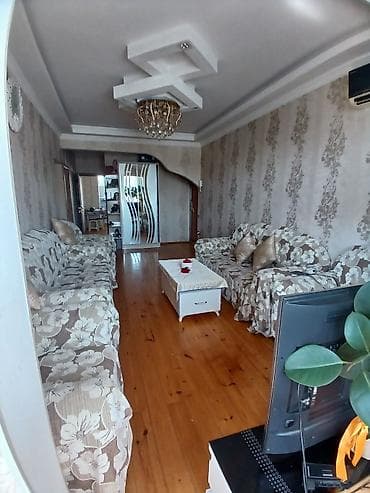 sumqayitda ev: Mənzilin təsviri - Geniş və işıqlı zal: İki tərəfli yerləşim, böyük — 3
