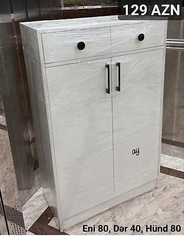 Ağ rəngli çoxfunksiyalı dolab Ölçülər: - Eni: 80 sm - Dərinlik: 40 sm