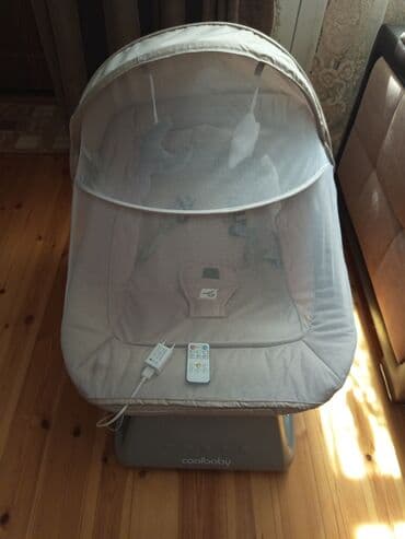 uşaq yellənçəyi: Coolbaby markalı elektrik uşaq yelləncəyi, ağ rəngdədir. Bu — 2