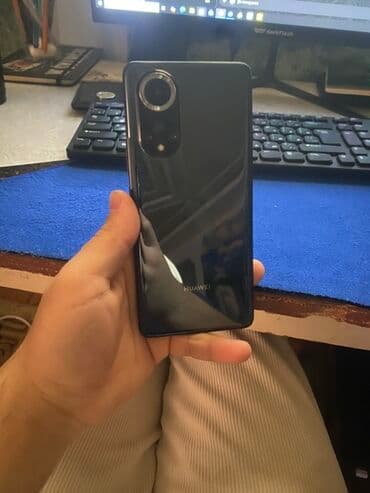 телефон fly 521: Huawei Nova 9, цвет - Черный, Две SIM карты — 4