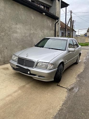 07 sekilleri cekmek: Mercedes-Benz C-Sinif sedan (W202), gümüşü rəng. - Kuzov: 4 qapılı — 8