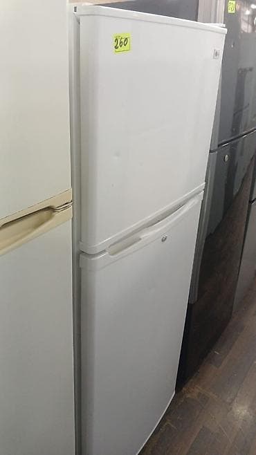 soydcu: Ağ rəngli iki qapılı soyuducu - Üstdə dondurucu bölmə, altda əsas — 1