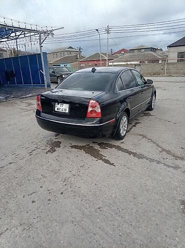 renge rover: Volkswagen Passat: 1.8 l | 2003 il Sedan — 4