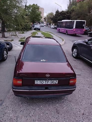 vaz 2107 paxlava salon: Opel Vectra sedan - Korpus: 4 qapılı sedan, tünd bordo rəng - Nömrə — 6