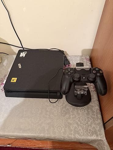 kamin elektrik: PlayStation 4 Slim oyun konsolu - Rəng: qara - Üst hissədə — 4