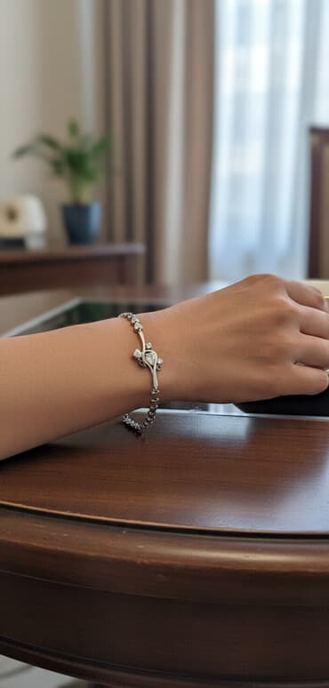 Gümüş zəncir qolbaq - Dizayn: Bütün uzunluq boyunca xırda ürək lalafo.az -da Gümüş zəncir qolbaq - Dizayn: Bütün uzunluq boyunca xırda ürək