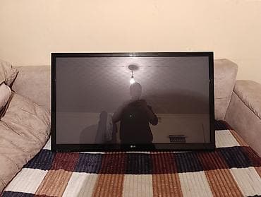 LG televizor, 108" ekran ölçüsü (diaqonal). Qara çərçivə düz ekranlı