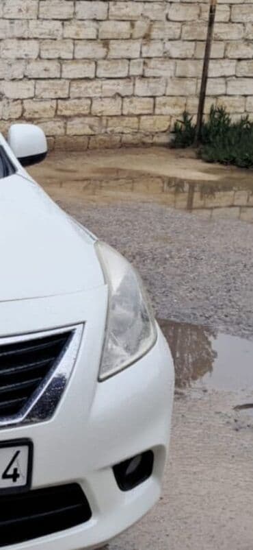 зарядное устройство для автомобильного аккумулятора в баку: Ağ rəngli sedan avtomobil 2013 Nissan Sunny 2013 orjinal fara. Ancaq — 1