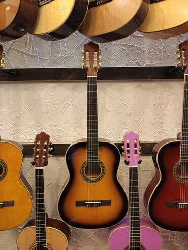 smiger: Klassik gitara

Smiger EC 310

Ölçü:4/4

Istehsalçı:Çin

Çanta hədiyyə — 1