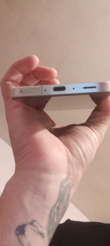 5 samsung olar: Samsung Galaxy A56, 256 GB, rəng - Gümüşü — 4