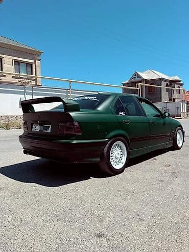 opel vektra 1998: BMW 3 series: 1.8 l | 1995 il Sedan — 1