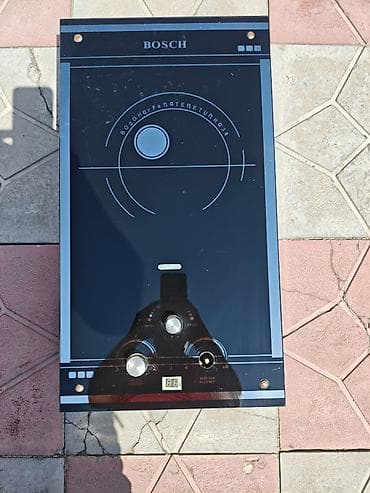 BOSCH markalı qazla işləyən su qızdırıcısı (divar tipli, şüşə ön