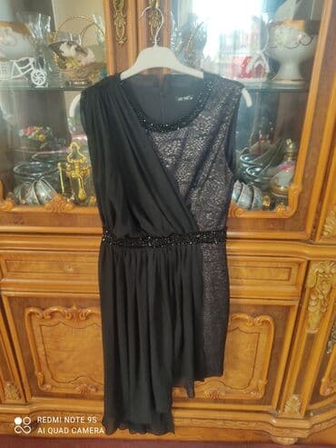 Dəstlər, kostyumlar: Qadın gecə paltarı - Rəng: qara - Dizayn: Asimmetrik kəsimli, bir — 1