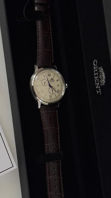 106 saat: Qol saatı, Orient, rəng - Qəhvəyi — 2