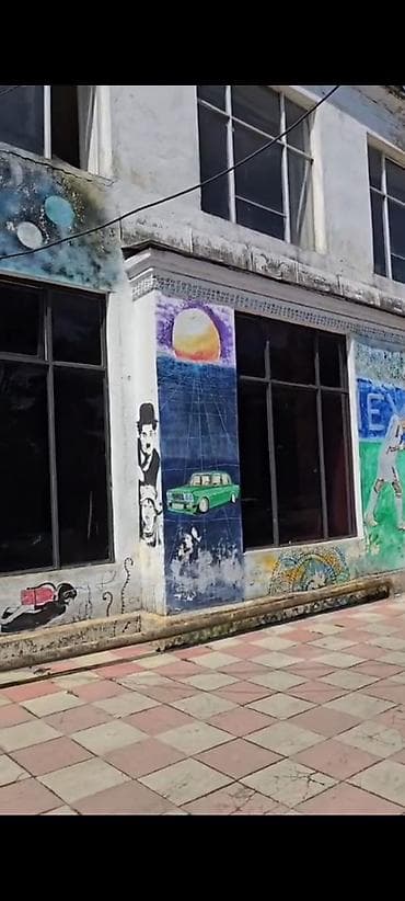 quba a frame evler: Lənkəranda H.Əliyev pr-də 700 m² sahəsi olan 2 mərtəbəli univermaq — 1
