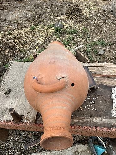 гул койгуч: Sağlam gil materialdan hazırlanmış ənənəvi küp (amfora tipli). Uzunsov — 5