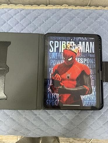 ipad satilir: Apple iPad (gümüş rəng) + qapaqlı futlyar Məhsul təsviri: - Planşet — 3