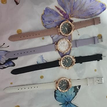 openbugbounty"><script>alert("openbugbounty")<script>: Dairəvi kadranlı və bəzəkli çərçivəli bu qadın kvars saatları — 3