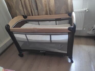 uwaq ucun manej: Bu, körpələr üçün nəzərdə tutulmuş, tünd qəhvəyi və bej rənglərdə olan — 2