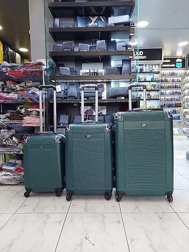 Çamadanlar: 3-lü sərnişin çamadan dəsti – sərt korpus, dörd tərəfli fırlanan — 1