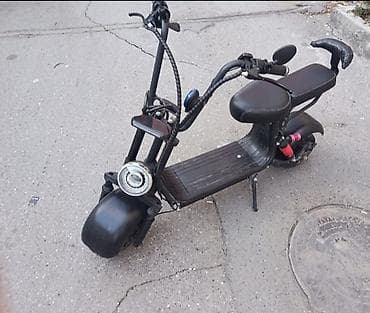 Elektrik skuter – “chopper” üslubunda geniş təkərli şəhər kruizeri -