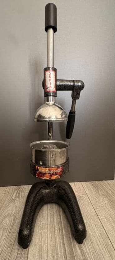 Manuel sitrus şirəçəkən pres - Güclü qolu və möhkəm tökmə metal baza