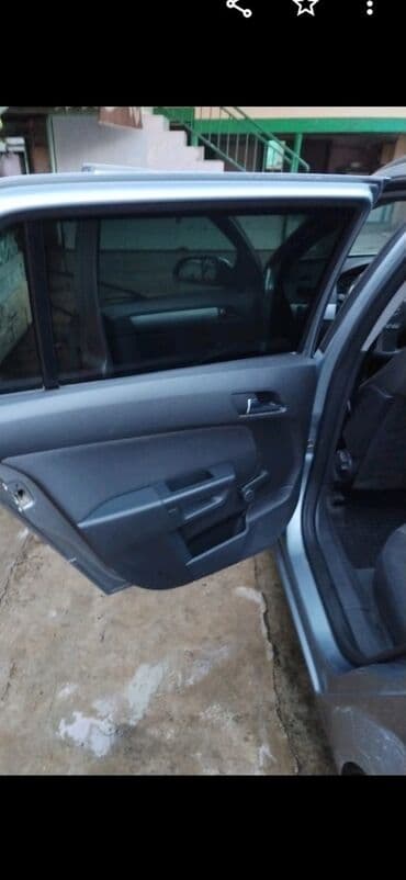 c 200 mercedes: Opel Astra: 1.3 l | 2006 il Universal — 9