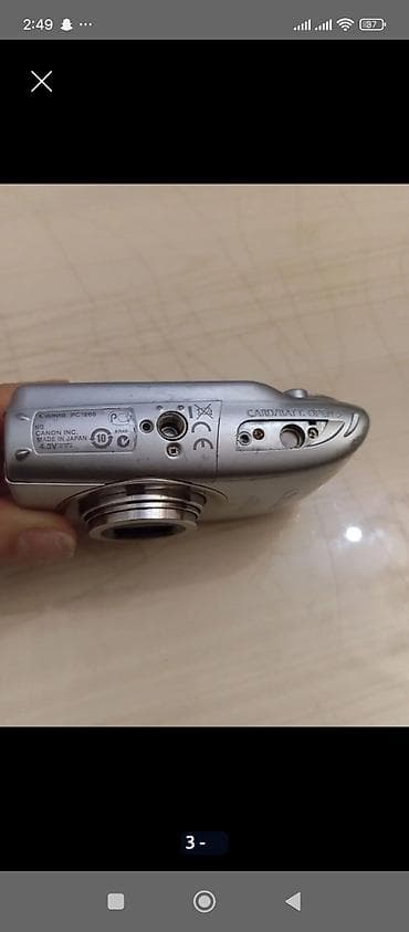 pc hisseleri: Canon Digital IXUS 970 IS (AiAF) kompakt fotoaparat - Gümüşü korpus — 6