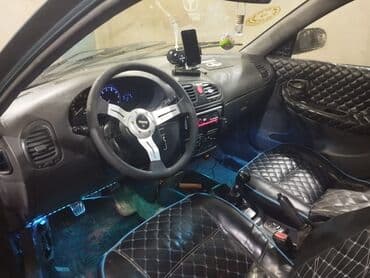 Скупка авто: Model: Daewoo Nubira (sedan) Rəng: Tünd yaşıl Yanacaq növü: Benzin — 4