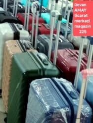 купить чемодан на колесах в баку: Sarı rəngli, sərt korpuslu, dörd təkərli səyahət çamadanı. Çamadanın — 9