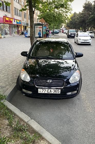 Hyundai Accent: 1.4 l | 2006 il Sedan