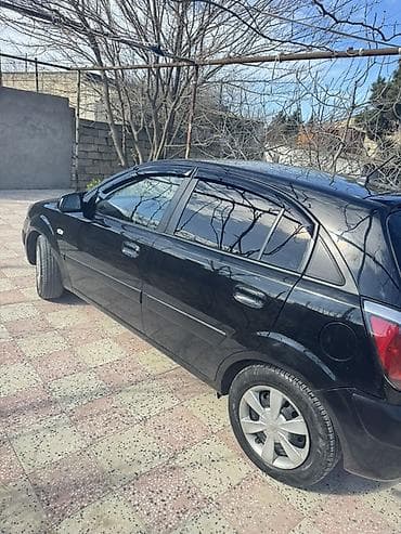 avtomobillər: Kia Rio: 1.5 l | 2007 il Hetçbek — 2