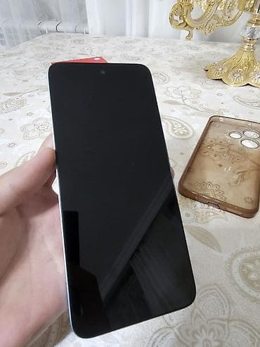 Mobil telefon və aksesuarlar: Redmi 13, 256 GB, rəng - Göy, Barmaq izi, Face ID — 2