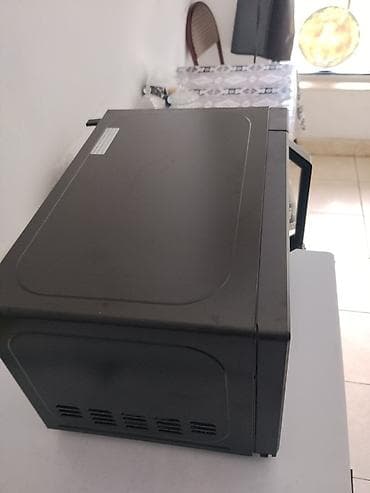 mini un dəyirmanı: Mikrodalğalı soba Toshiba, Ayrıca dayanan, Mikrodalğalar ilə, rəng - Qara, Yeni — 5