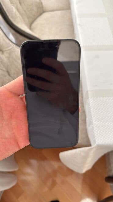 Apple iPhone: IPhone 15 Pro, Qara — 1