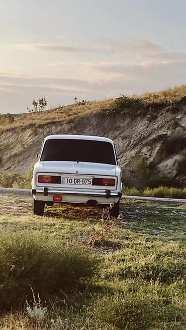 vaz 2107 kredit satilir: VAZ 2106, ağ rəng. Klassik sedan kuzov, ön ikili dairəvi faralar, xrom — 3