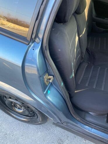 oka satılır: Model: Opel Astra Caravan (universal kuzov) Rəng: tünd boz Yanacaq — 7