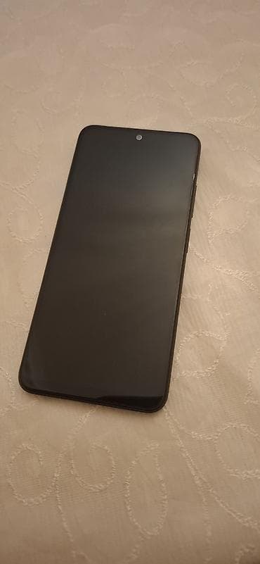 telefon aliram: Xiaomi Redmi smartfon - Model: Redmi (arka qapaqda Redmi loqosu). - — 2