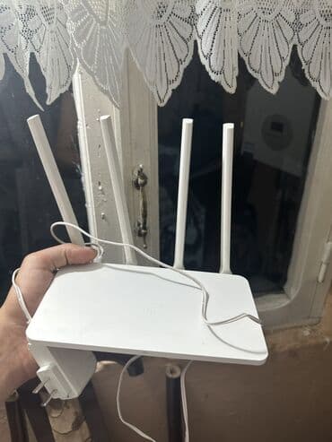 naxtel elaqe: Ağ rəngdə olan Xiaomi router, evdə və ya ofisdə internetə qoşulmaq — 2