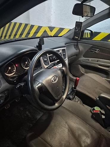 avtomobillər: Kia Rio: 1.5 l | 2007 il Hetçbek — 6