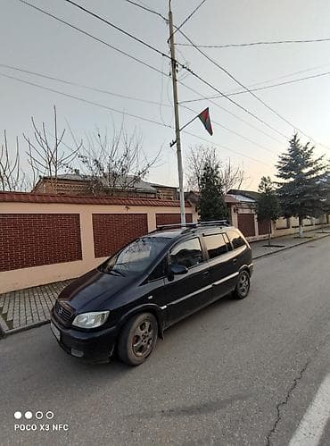 запчасти форд фокус 1: Opel Zafira A, qara rəng, 7 yerlik miniven. Xüsusiyyətlər: - Geniş — 5