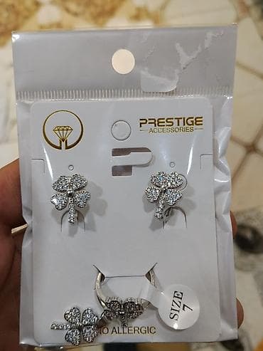 gps saat: Qızılı zərgərlik dəsti - Tərkib: qolbaq, üzük, sırğalar (1 cüt) və — 3