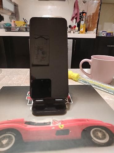 telefon saxlayan: Redmi A1+, 32 GB, rəng - Qara, Barmaq izi — 6