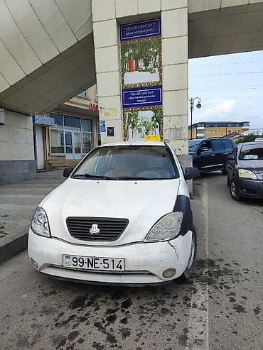 tesla disk: Ağ rəngli sedandır. 4 qapı, 4yerlik salon. Mexaniki sürətlər qutusu — 4