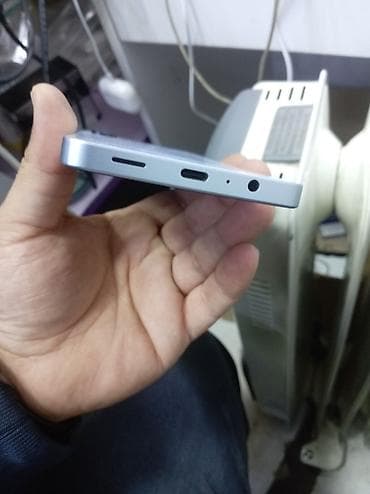 telefonlar s 32: Samsung Galaxy A06, 128 GB, rəng - Gümüşü, Sənədlərlə — 2