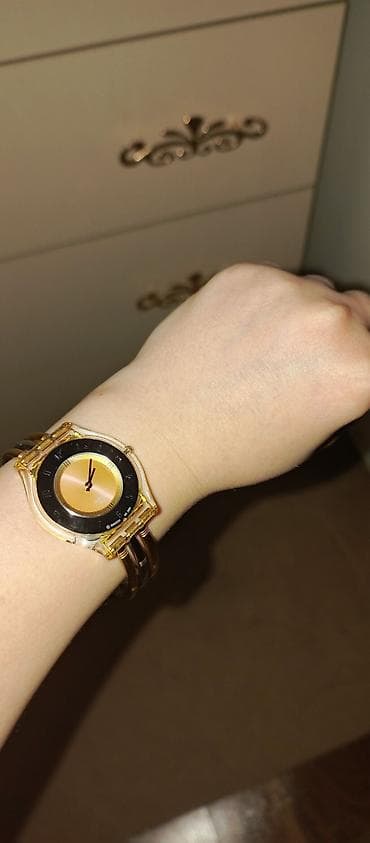 Smart saatlar: Qol saatı, Swatch, rəng - Qızılı — 1