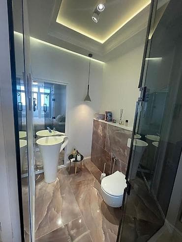 Mənzillər: İcarəyə verilir 2 otaqlı yeni tikili 81 m², Xətai r. Kateqoriya Yeni — 9