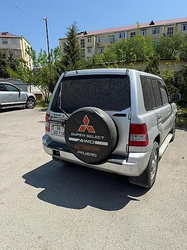bmw x5 disk: Mitsubishi Pajero IO, gümüşü rəngdə, 5 qapılı kompakt SUV. Texniki və — 3