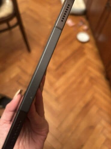 modio planşet: Modio planşet Xüsusiyyətlər: - Qara rəngdə, nazik alüminium gövdə — 2